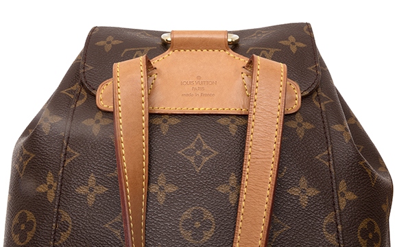 louis vuitton backpack with gold plate on front