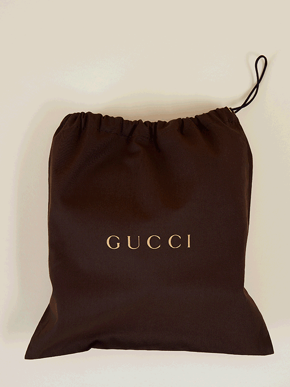 Animation Of Gucci Bag Wiggling In And Out Of Dust Bag