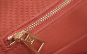 A Branded Louis Vuitton Zipper In A Speedy Bag