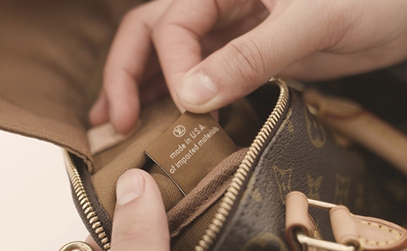 The Origin Tag On A Louis Vuitton Speedy Bag
