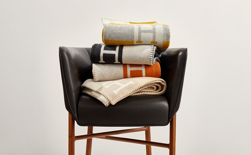 Stack Of Hermès Avalon Blankets On An Hermès Cabriolet Chair