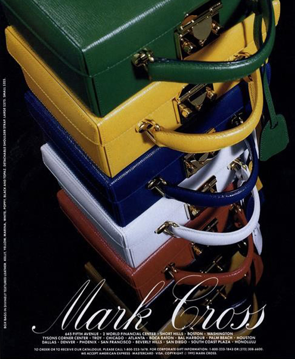 Vintage ad showing a rainbow of stacked Mark Cross handbags