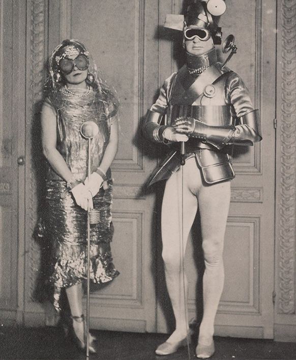 Black and white photo of Sara & Gerald Murphy who once owned handbag company Mark Cross dressed up in costumes 