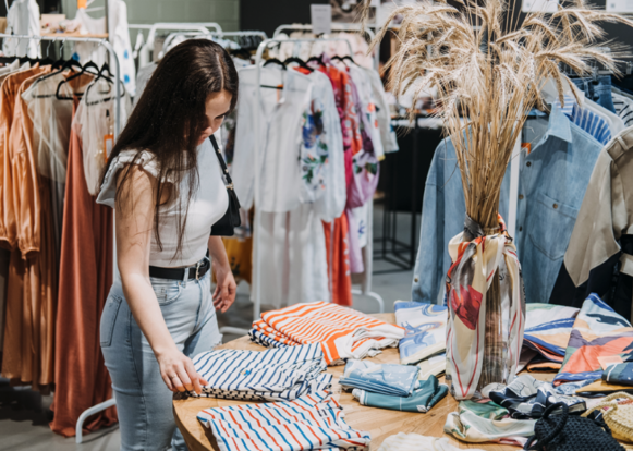 Woman shopping for sustainable fashion